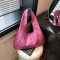 Chic magenta pink leather tote bag with unique diagonal stitching and wide shoulder strap - Pink