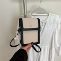 Vertical black and white crossbody phone bag with gold clover clasp and lace pendant - With Pendant / Black