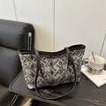 Elegant large tote bag featuring gray and black jacquard fabric with geometric patterns - Black