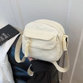 Cute off-white corduroy crossbody bag for women featuring front pocket and rope zipper pull - White
