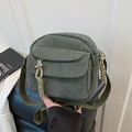 Dark green corduroy crossbody bag for women with woven zippers and adjustable strap - Green