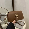 Retro brown leather baguette shoulder bag with gold buckle and adjustable strap - Brown