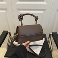 Dark brown faux leather handbag with unique double knotted handle and shoulder strap - Brown