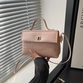 Pink Kelly style handbag with houndstooth texture and golden twist lock closure - Pink