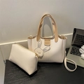 Off-white tote and pouch set in lychee texture PU leather with stylish rabbit charm - White
