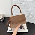 Elegant brown patchwork crossbody bag with smooth leather and textured fabric design - Brown
