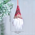 Christmas gnome doll with red knitted hat and white beard hanging on a pine tree - Brown and Red Geometric Style (005)