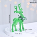 Green flocked reindeer ornament with leaf collar and silver hanging cord for Christmas - Flocked Green Reindeer