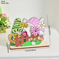 Colorful wooden Easter gnome puzzle decoration with stripes and polka dots pattern - Couple Gnomes Fence Style