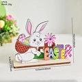Wooden Easter puzzle ornament featuring a colorful cartoon rabbit and artful Easter lettering - Rabbit Carrying Egg Letters Style