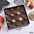 Set of nine brown velvet Christmas ornaments with white specks in a black gift box - Coffee