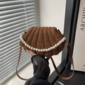 Deep brown suede shell-shaped crossbody bag with decorative large pearl handle and strap - Brown