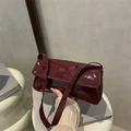Vintage burgundy patent leather underarm bag with glossy finish and slim shoulder strap - Red