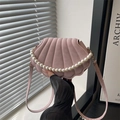 Pink shell-shaped crossbody bag with pearl handle and slim shoulder strap - Pink