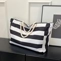 Large striped canvas tote bag with thick white rope handles and convenient side pockets - Black