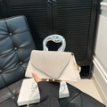 Bolso pequeño blanco con diamantes de imitación plateados y asa metálica única - Blanco