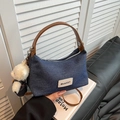 Deep blue denim dumpling bag with brown handles and a cute white teddy bear charm - With Pendant / Denim Brown