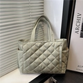 Sage green quilted tote bag with diamond lattice pattern and convenient side pockets - Green Without Charm