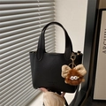 Black litchi grain bucket bag with dual handles and cute plush bear charm accessory - With Pendant / Black