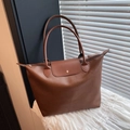 Brown faux leather tote bag with zip closure and leather flap for shoulder wear - Brown