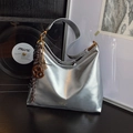 Metallic silver hobo shoulder bag in shiny finish with unique hanging charms - With Pendant / Silver