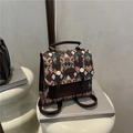 Vintage rugzak met geometrische geweven stof, bruin kunstleer en gouden metalen details - Groen