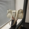 Creamy white Y2K style faux leather shoulder bag with silver buckles and metal eyelets - White