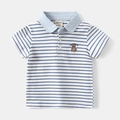 Detailed flat lay of blue striped boys' polo shirt with bear embroidery and light blue collar - 90 / Blue and White Stripes