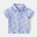 Detail of baby boy polo shirt with bear print and branded woven neck label and size tag - Blue Printed / 90cm