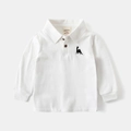 Close-up of white knit cotton kids polo shirt featuring a small dinosaur embroidery - White / 90cm