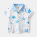 Detail of baby boy polo shirt with light blue collar and watercolor star patterns - 90cm / White Star Print