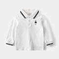 Detail of white cotton polo shirt featuring polo bear embroidery and striped collar - 90cm / White