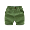 Kids grass green cotton shorts with elastic waist and decorative brown button detail - Army Green / 90cm