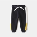 Dik gevoerde donkerblauwe joggingbroek voor jongens met gele details en trekkoord taille - Maat 90 / Marineblauw met gele streep