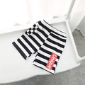 Boys' summer shorts with black and white horizontal stripes and red Unique patch label - Navy White Striped / 90cm