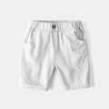 White cotton boys shorts with elastic waist, wood button detail and front square pockets - White / Size 90