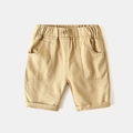 Pantalones cortos clásicos de algodón caqui para niños con cintura elástica y bolsillos - Caqui / Talla 90