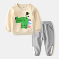 Toddler boys casual two-piece tracksuit with beige crocodile sweatshirt and grey joggers - Cream White Crocodile / Size 90