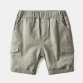 Boys khaki green cargo shorts with elastic waist and side pockets for summer wear - Light Green / Size 90