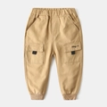 Kids khaki cargo pants with elastic waist and Hey embroidery on the side pocket - Khaki / Size 90