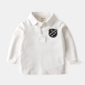 Polo classica bianca a maniche lunghe per bambini con ricamo a scudo di qualità - Bianco
