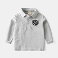 Klassisches graues Langarm-Poloshirt für Jungen mit aufgesticktem Schildwappen - 90 / Grau
