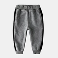Detail of boys fleece-lined grey joggers with side stripes and elastic waistband - 100 / Dark Gray