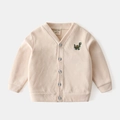 Gilet en maille beige pour enfants avec broderie dinosaure vert et col en V - Abricot