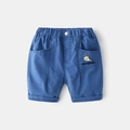 Detail of boys' blue cotton shorts featuring whale embroidery and elastic waistband - 90cm / Royal Blue
