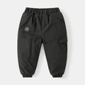 Detail of kids black winter cargo pants with elastic waist and embroidered badge logo - 110cm / Black