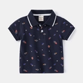Close-up of boys polo shirt featuring space rocket prints and white contrast collar - Navy Blue (Rocket) / 90cm