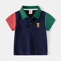 Kids color-block short sleeve polo shirt with cartoon lion embroidery and wild text - 90cm / Navy Blue Colorblock
