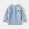 Maglione in maglia a coste azzurro per bambini con ricamo a forma di leone - 90cm / Celeste