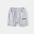 Detail of light gray boy's cotton shorts with elastic waist and large side pockets - Light Gray / 90cm